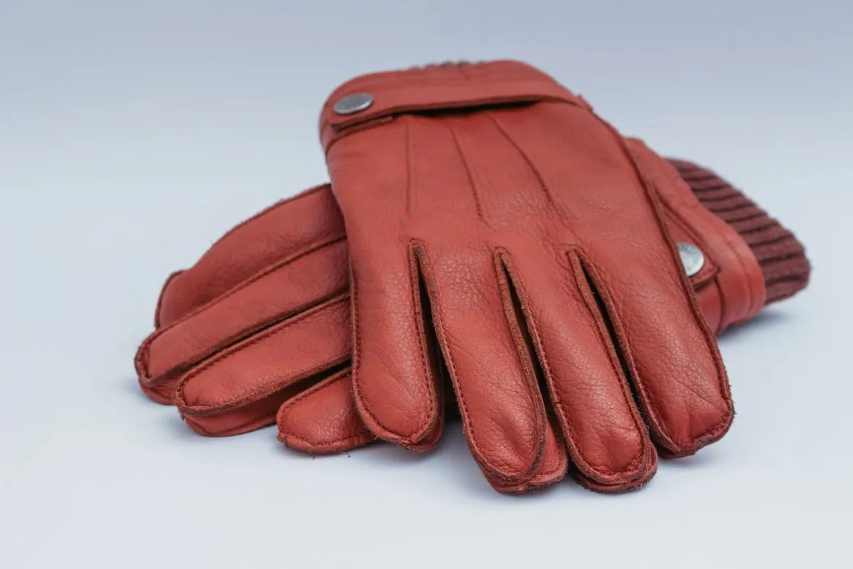 Red leather winter gloves, standing in for the Northvane Heat Glove 3